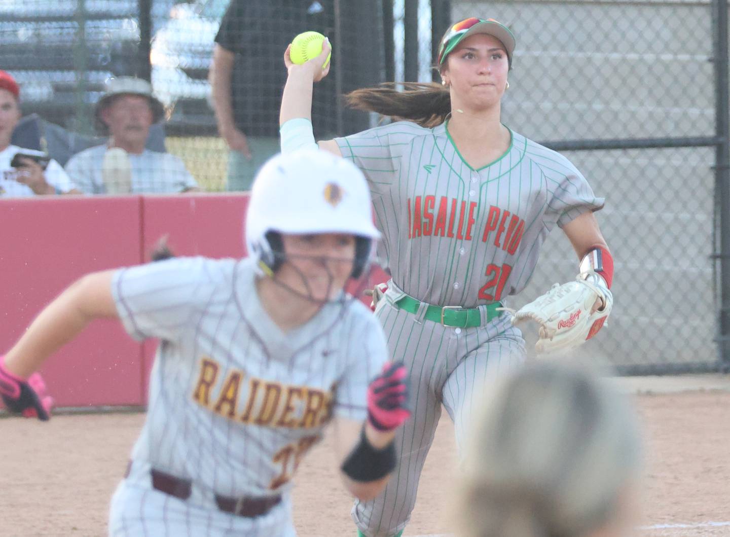 L-P's Anna Riva throws out East Peoria's Kailynn Gore at first during the Class 3A Sectional semifinal game on Tuesday, May 26, 2026 at the L-P Athletic Complex in La Salle.