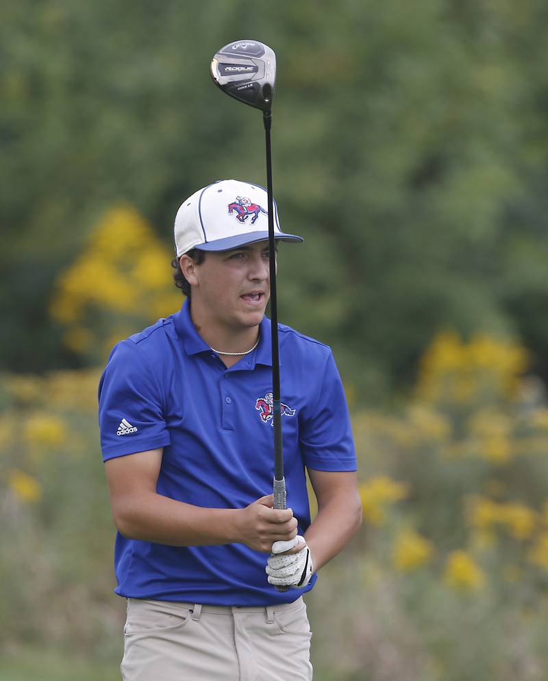 Dundee-Crown’s Cam Schmeiser watches his tee shot on the seventh hole during the IHSA Class 3A Hampshire Regional golf tournament on Wednesday, Sept. 27, 2023, at Randall Oaks Golf Club in West Dundee.
