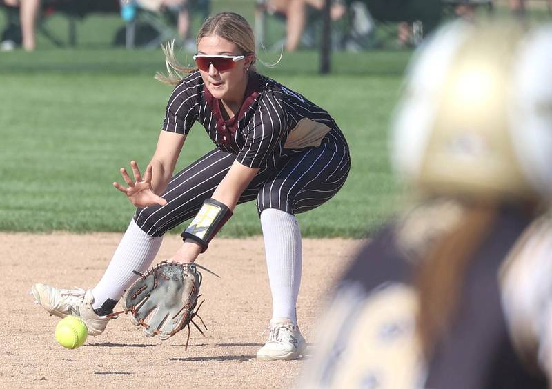 Morris' Macie Ferguson fields a grounder to throw out a Sycamore hitter during their game Wednesday, May 10, 2023, at Sycamore High School.