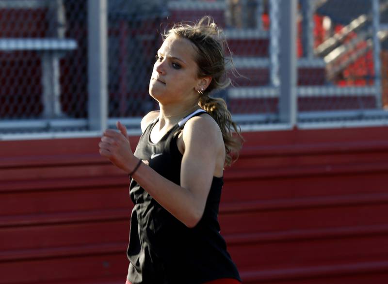 Huntley’s Myla Wade races to the finish line to Wim the 400 meter dash on Thursday, May 8, 2025, during the Fox Valley Conference Girls Track and Field Meet at Huntley High School.