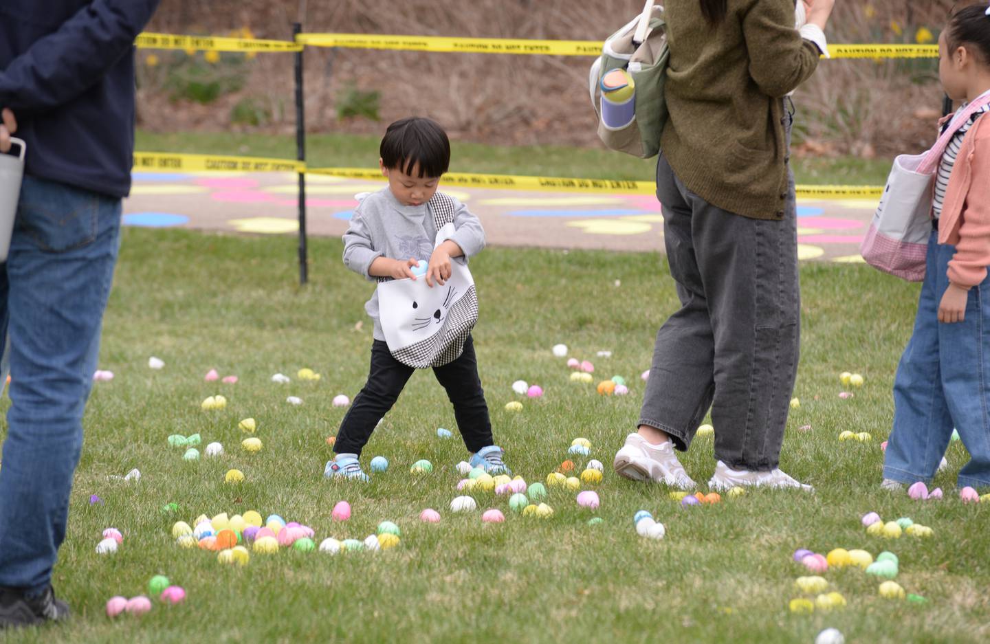 Emmett Yu of Aurora chooses his 5 Easter Eggs during the Easter Egg Hunt held at Cantigny  Sunday April 13, 2025.