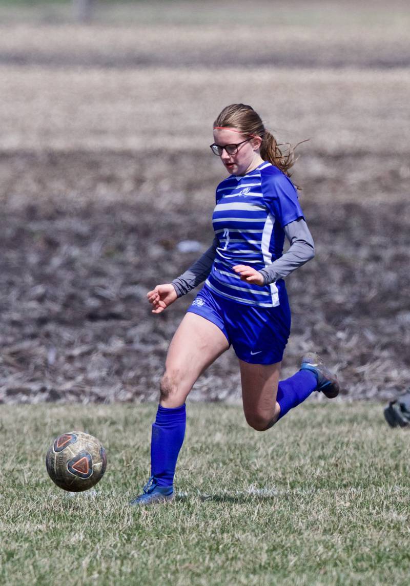 Princeton's Norah Schneider runs the ball down in Saturday's third-place game of the Princeton Invitational vs. Streator.