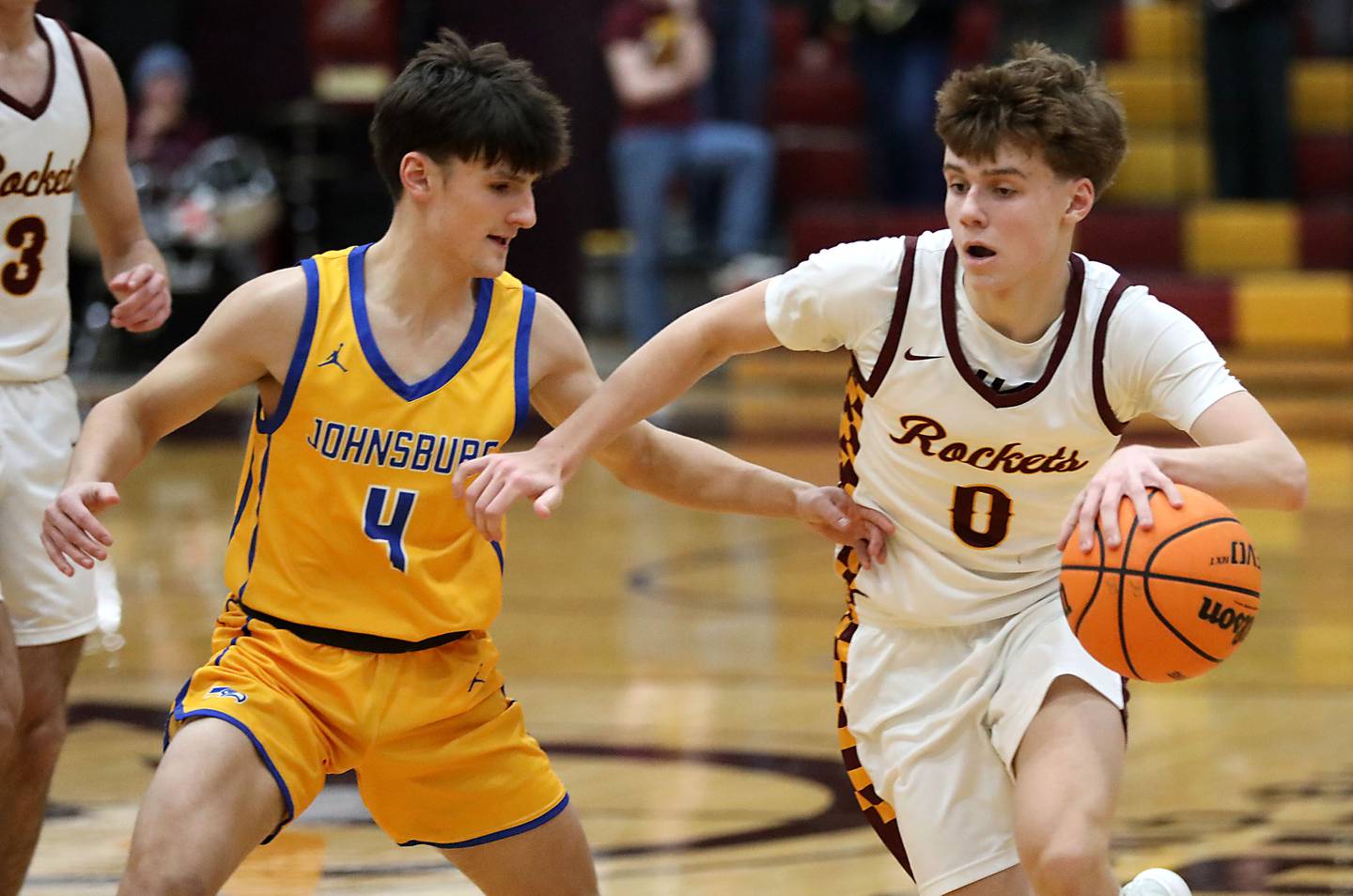 Richmond-Burton's Gavin Radmer brings the ball up the court against Johnsburg's Brady Fisher during a Kishwaukee River Conference boys basketball game on Tuesday, Jan. 27, 2026, at Richmond-Burton High School.