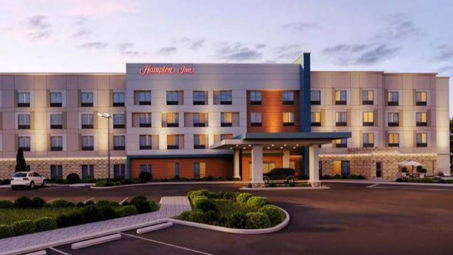 A digital model of the recently approved Huntley Hampton Inn hotel shows the four-story, 100-room structure which will be surrounded by parking lots on all four sides. Construction is set to begin later this summer so that the building can be open by December 2021.