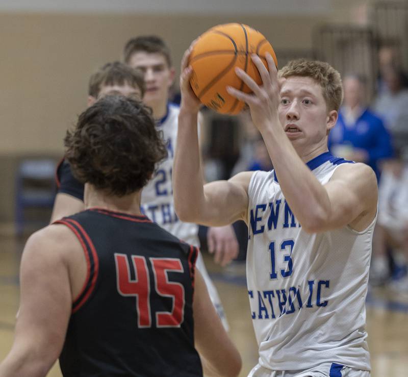 Newman’s George Jungerman looks to put up a shot against Erie-Prophetstown Wednesday, Jan. 29, 2025, at Newman High School.
