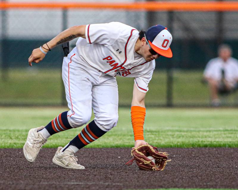 Oswego's Ethan Valles (5) fields a grounder during Class 4A Romeoville Sectional semifinal game between Plainfield North at Oswego.  June 1, 2023.