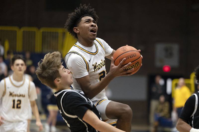 Sterling’s Kaedon Phillips goes hard to the hoop Tuesday, Jan. 24, 2023 against Galesburg.