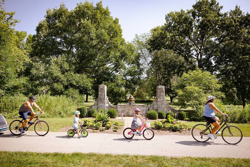 Family enjoying a bike ride at Mt. St. Mary Park in St. Charles.