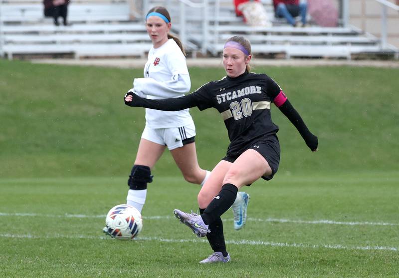 Sycamore's Cortni Kruizenga gets behind a couple of La Salle-Peru players for a shot during their game Wednesday, April 9, 2025, at Sycamore High School.