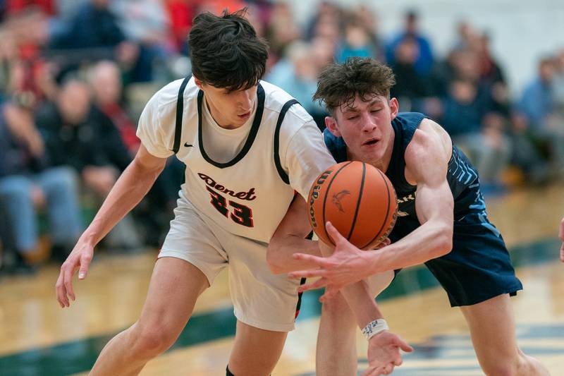 Benet’s Nikola Abusara (23) and Lake Park's Camden Cerese (1) fight for a loose ball during a Bartlett 4A Sectional semifinal boys basketball game at Bartlett High School on Tuesday, Feb 28, 2023.