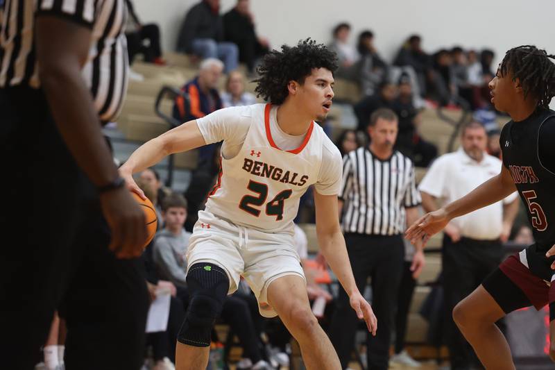 Plainfield East’s Kobe Jordan looks to make a play against Plainfield North on Tuesday, Jan 14, 2025.
