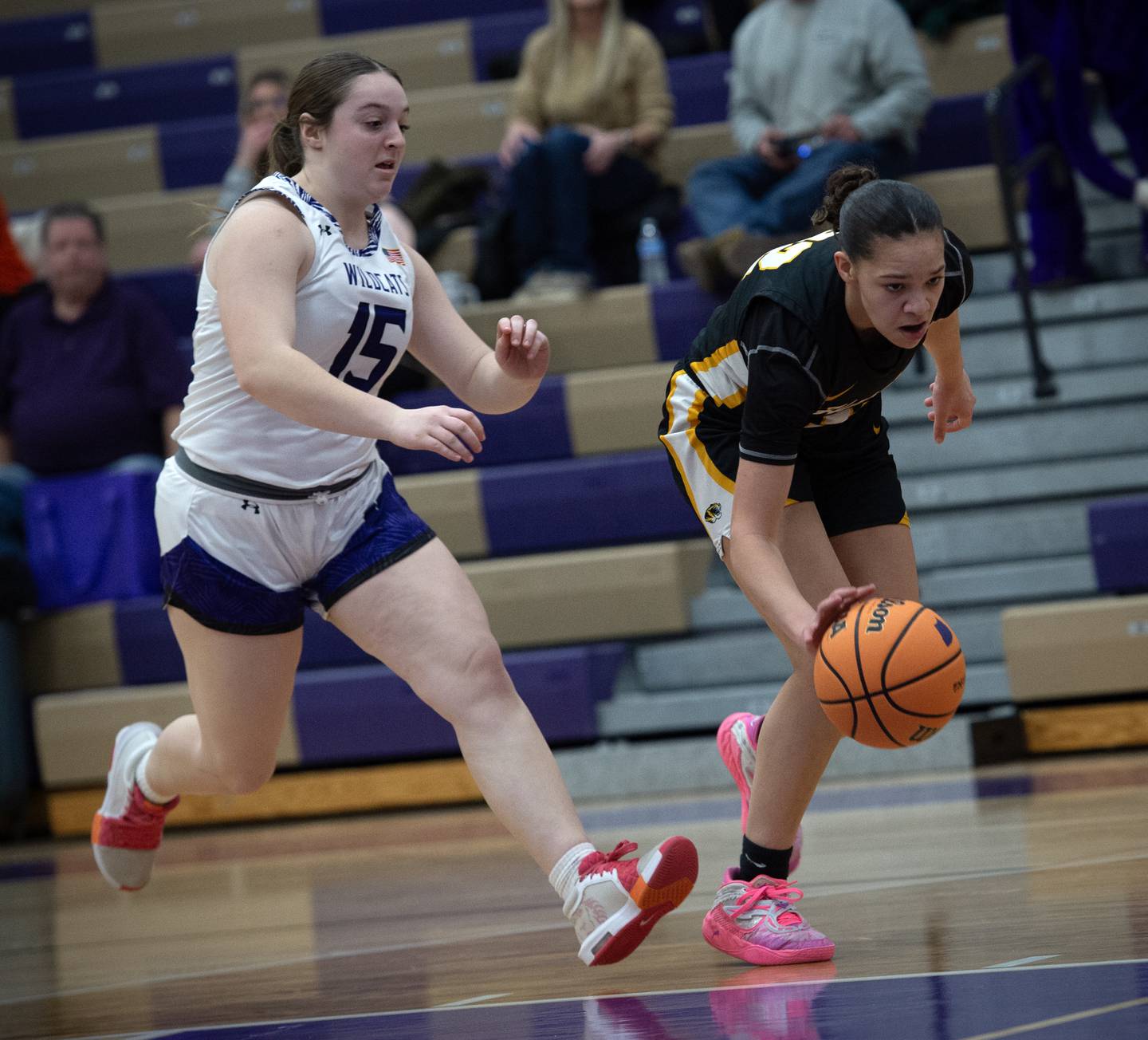 Herscher's Leia Haubner, right, leads on a break away as Wilmington's Lexi Strohm, left, follows in a game on Thursday, January 29, 2026.