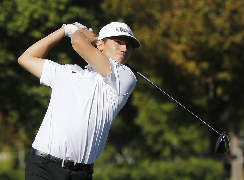 Prairie Ridge’s Jack Dahlem watches his tee shot on the 7th hole during the Fox Valley Conference Boys Golf Tournament Thursday, Sept. 25, 2025, at Foxford Hills Golf Club in Cary.