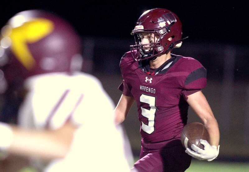 Marengo’s Drew Johnson runs the ball against Richmond-Burton in varsity football at Rod Poppe Field in Marengo Thursday night.