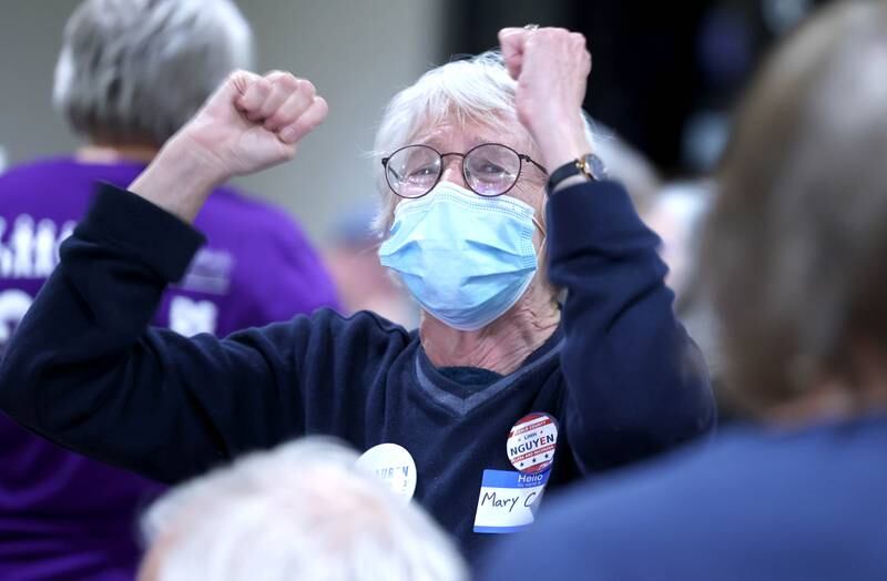 Mary Lee Cozad, Democratic candidate for DeKalb County Board District 10, celebrates as some election returns are announced Tuesday, Nov. 8, 2022, during an election night watch party at River Heights Golf Course in DeKalb.