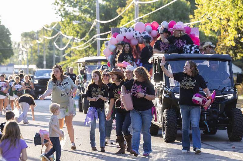 A squad from Dillon School marches Thursday, Sept. 25, 2025, through the Rock Falls homecoming parade.