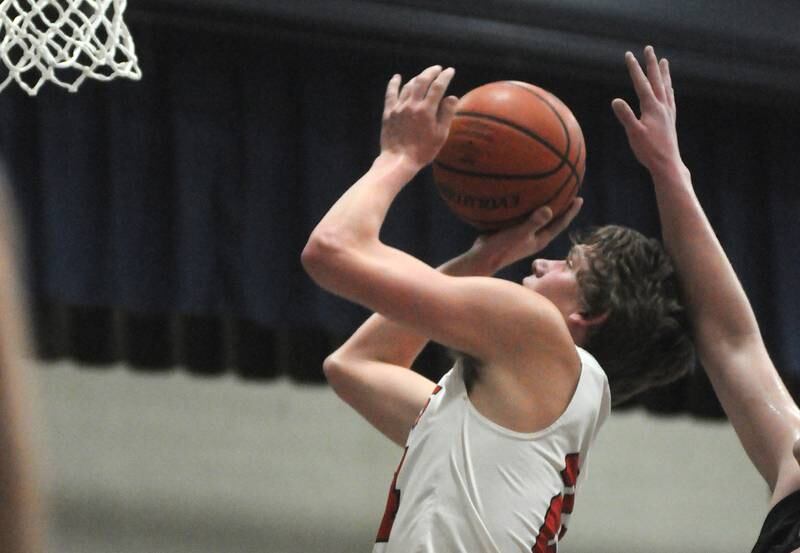 Earlville's Ryan Browder shoots in the Marquette Holiday Tournament on Tuesday, Dec. 26, 2023.