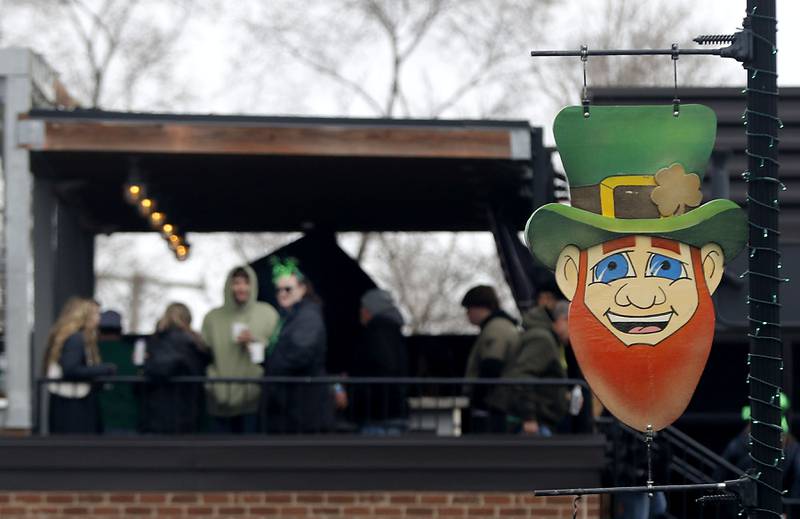 People wait for the McHenry ShamROCKS the Fox Festival Parade on Saturday, March 14, 2026. In McHenry.