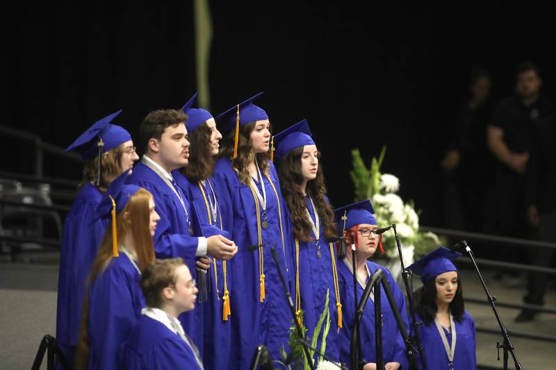 Senior members of the St. Charles North choir perform during the school’s commencement ceremony at Northern Illinois University in DeKalb on Monday, May 20, 2024.