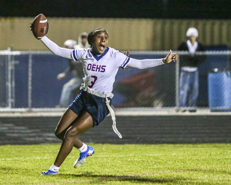 Oswego East's Avaya Kittling-turner (3) scores the winning touchdown during Oswego East Regional Final flag football game between St. Charles North at Oswego East Thursday, Oct 9, 2025 in Oswego.