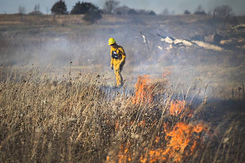 Line boss Susan Kleiman keeps an eye on the north side of the prescribed burn Tuesday, Nov. 14, 2023 at the Nachusa Grasslands.