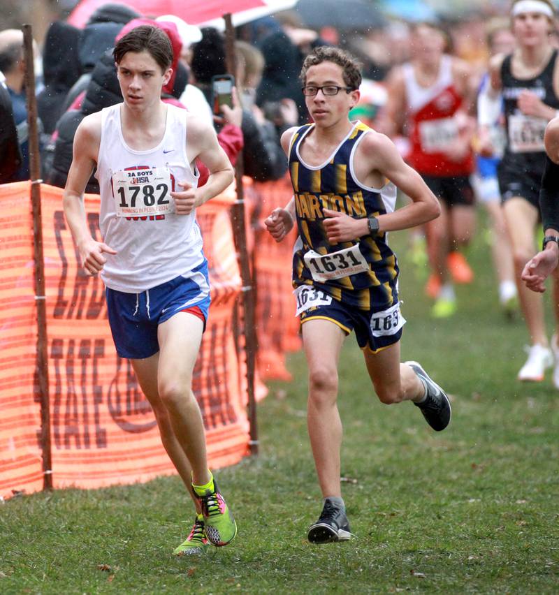 Glenbard South's Thomas Jochum (left) competes in the Class 2A State Cross Country Championships on Saturday, Nov. 9, 2024 at Detweiller Park in Peoria.