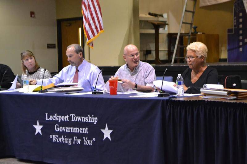 Members of Lockport Township government listen to Fairmont residents about what to do with the community's water system.
