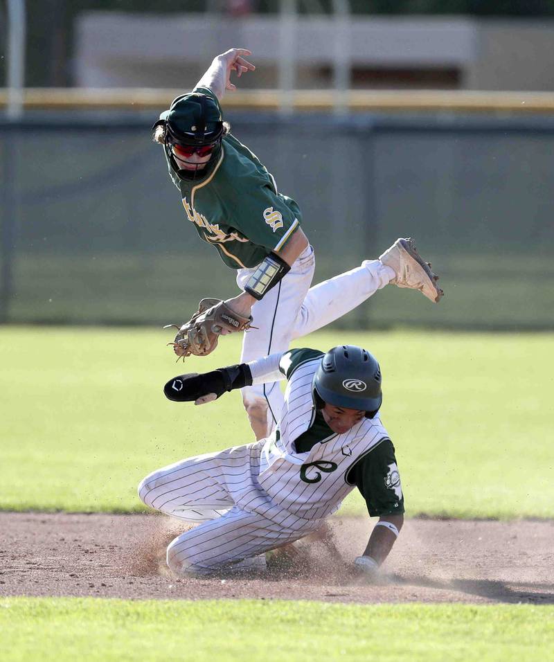 Crystal Lake South's Mason Struck just misses putting out Grayslake Central's Ralph DeLeon at second base during the IHSA Class 3A sectional semifinals, Thursday, June 2, 2022 in Grayslake.