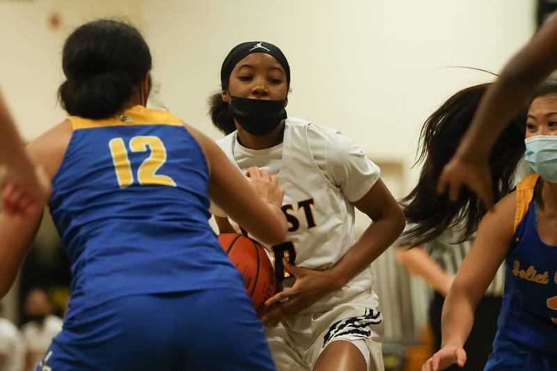 Joliet West’s Lisa Thompson looks to make a play against Joliet Central. Tuesday, Feb. 8, 2022, in Joliet.