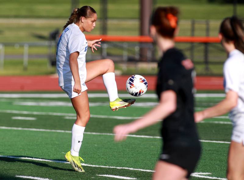 Geneva's Olivia Hagen handles the ball during the Class 3A St. Charles East Regional final against St. Charles East on Friday, May 23, 2025 in St. Charles.