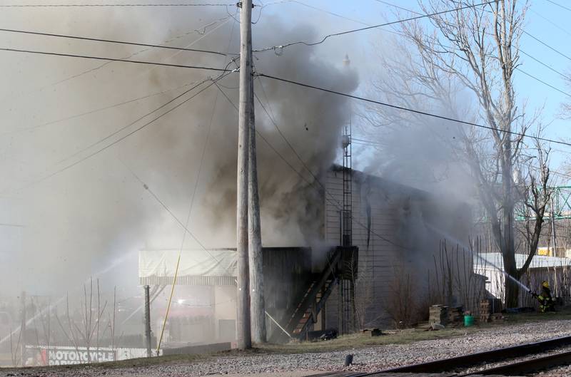 Black smoke billows from a structure fire at the former Platform 31 tavern on Monday, March 24, 2025 on Water Street in Peru. The fire was upgraded to a three-alarm summing ire departments from La Salle, Utica, Mendota, Tonica, Ottawa, Ladd, Spring Valley, Lostant, Cedar Point, Troy Grove and Peru responded to the fire.
