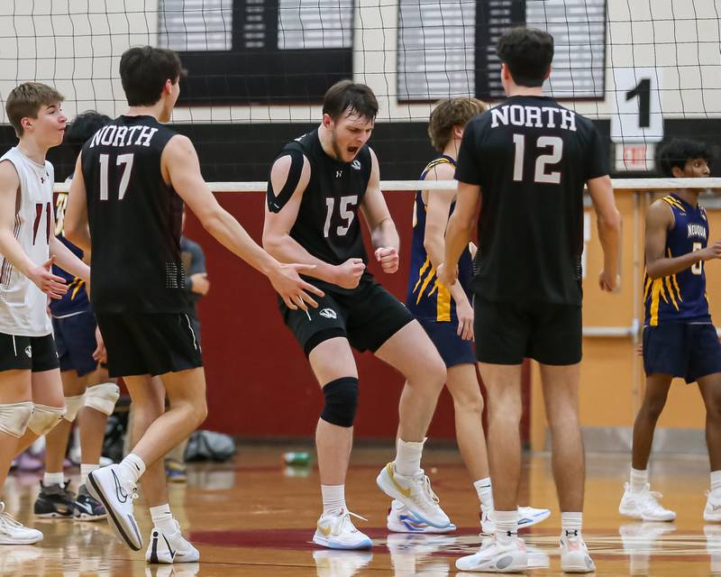 Plainfield North's Cole Clarke (15) celebrates the winning kill during volleyball match between Neuqua Valley at Plainfield North.  April 29, 2024.