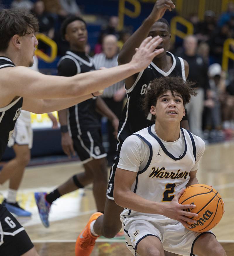 Sterling’s Deandre Maas looks to make a play against Galesburg Tuesday, Feb. 10, 2026.