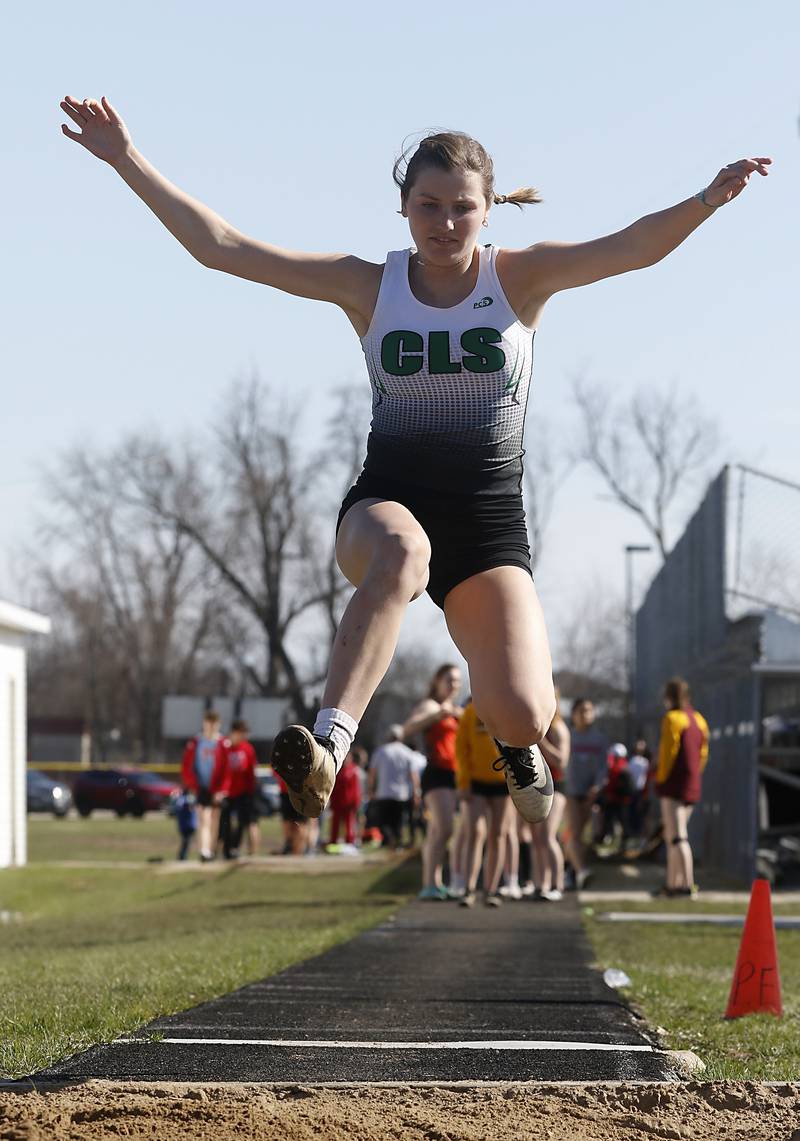 Crystal Lake South’s Ashley Ciezadlo competes in the triple jump Thursday, April 21, 2022, during the McHenry County Track and Field Meet at Richmond-Burton High School.