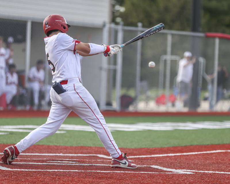 Yorkville's Nick Parashis (5) hits a pitch to the opposite field during baseball game between Oswego East at Yorkville. Monday, May 12, 2025 in Yorkville.
