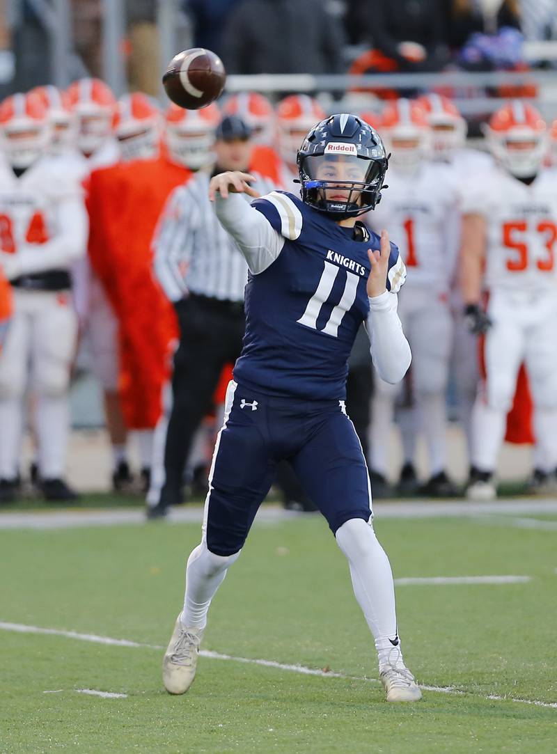 IC Catholic's Dennis Mandala (11) passes the ball during the Class 3A varsity football semi-final playoff game between Byron High School and IC Catholic Prep on Saturday, Nov. 19, 2022 in Elmhurst, IL.