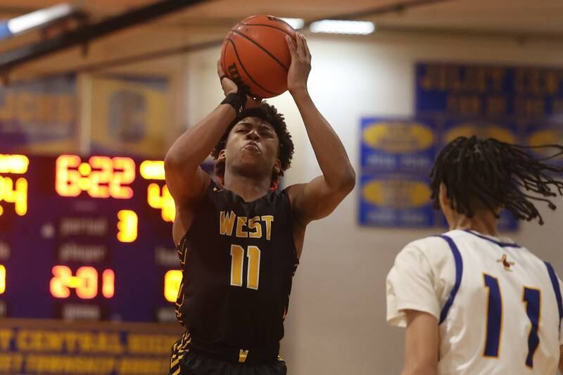 Joliet West’s Jeremy Fears puts up a jump shot against Joliet Central.