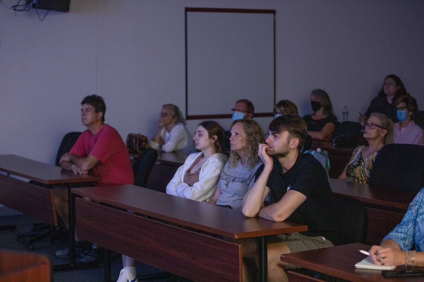 Attendees watch Lt. Williams' "Surviving an Active Shooter" presentation at the Kane County Sheriff's Office on Tuesday, July 19, 2022.