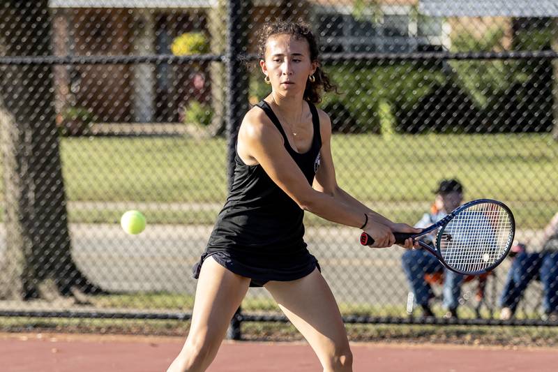 Joliet Township’s Sofia Mancilla competes in varsity doubles tennis during a match against Joliet Catholic at Joliet West on Sept. 29, 2025.