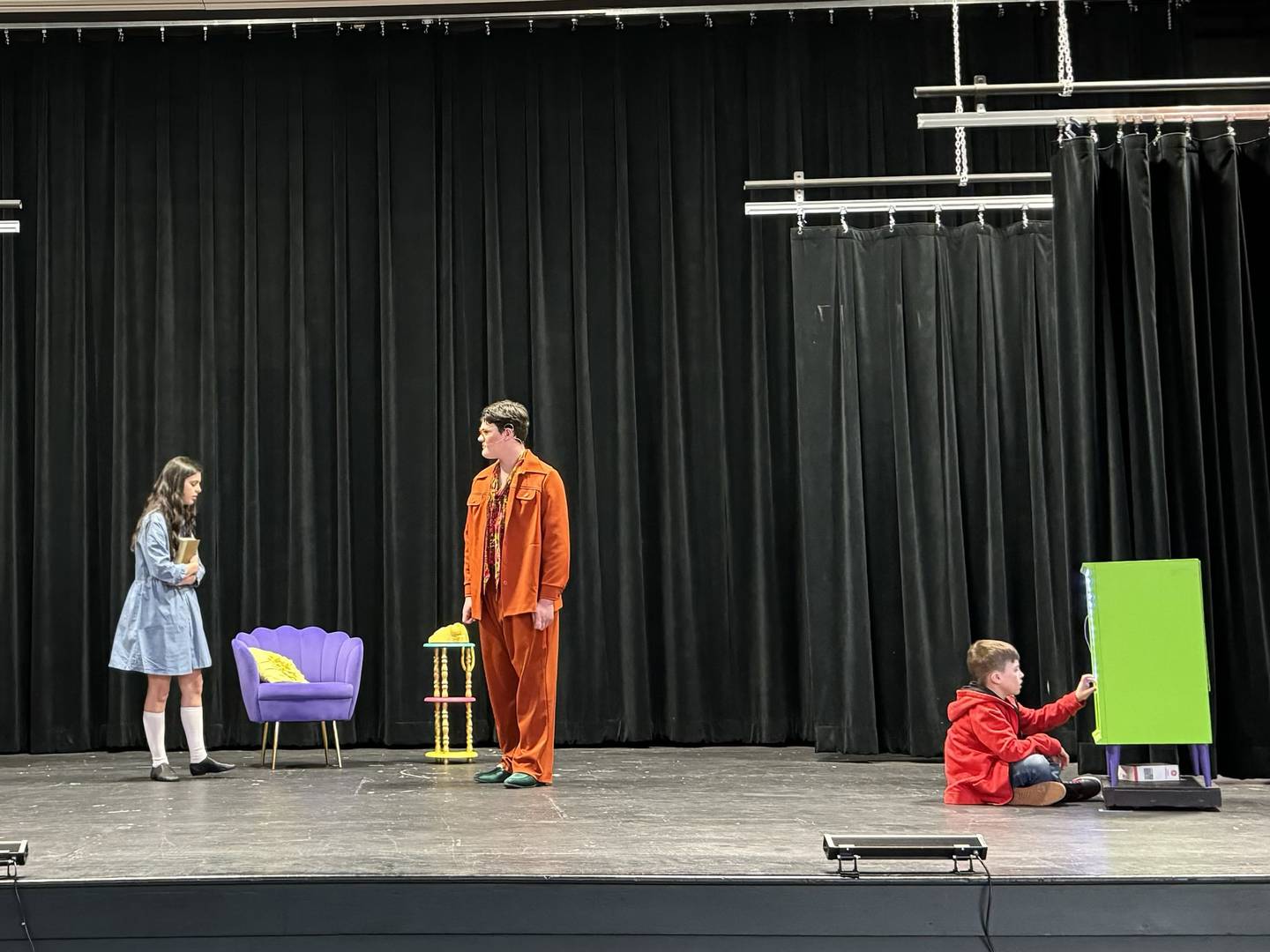 Matilda is lectured by her father during Saratoga Elementary's rehearsal of its spring play, "Matilda."