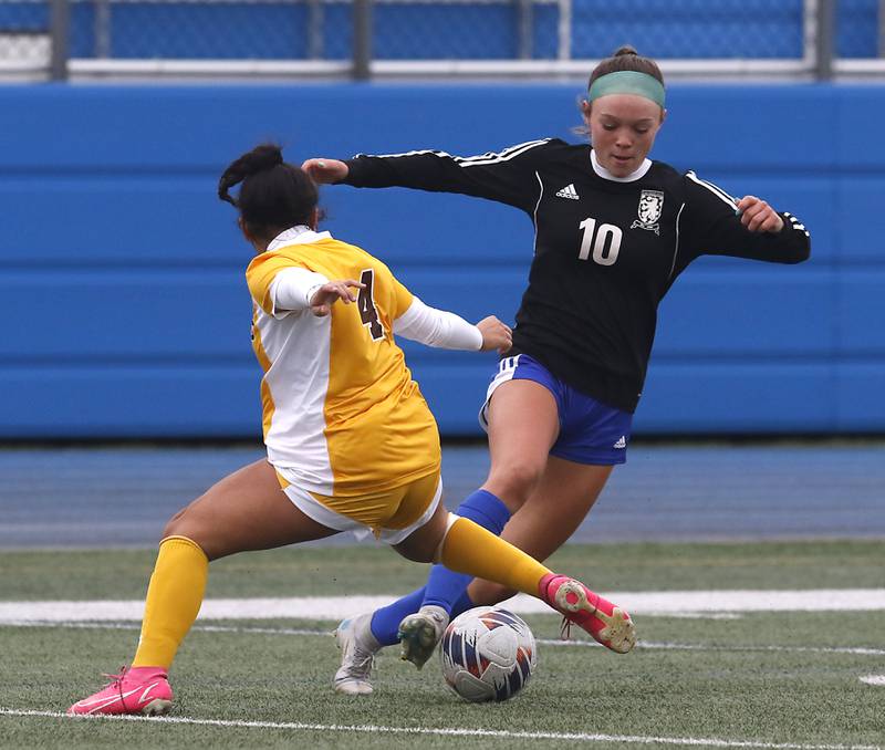 Jacobs' Sam Diaz tries to take the ball from Lake Zurich’s Sydney Arendarzyk during a nonconference girls soccer match Tuesday, April 4, 2023, at Lake Zurich High School.