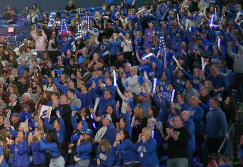 Fans from Lincoln Way East high school watch the cheerleading team perform during the Competitive Cheerleading State Finals on Saturday, Feb. 3, 2024 at Grossinger Motors Arena in Bloomington.