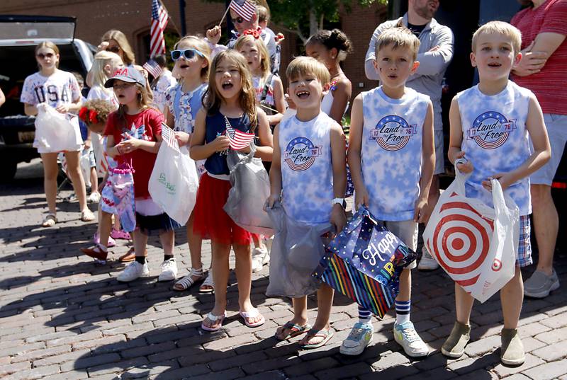 Marine Corps League Children cheer as they wait for the parade to start during the Woodstock VFW Post 5040 City Square Memorial Day Ceremony and Parade on Monday, May 29, 2023, in Woodstock.