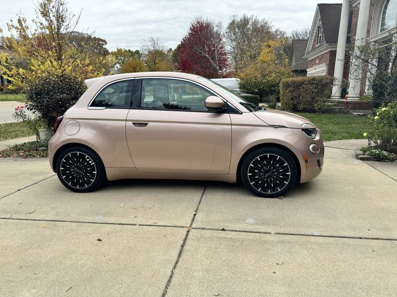 The 2024 Fiat 500e Inspired By Beauty model features EV efficiency, distinct Rose Gold exterior.