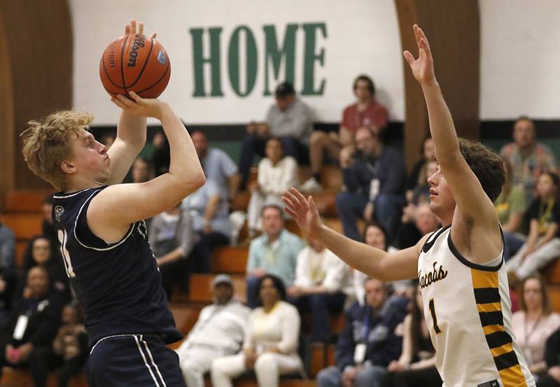 Cary-Grove's Landon Nawracaj shoots the ball over Jacobs' Ben Jurzak during the boy’s game of McHenry County Area All-Star Basketball Extravaganza on Sunday, April 13, 2025, at Alden-Hebron’s Tigard Gymnasium in Hebron.