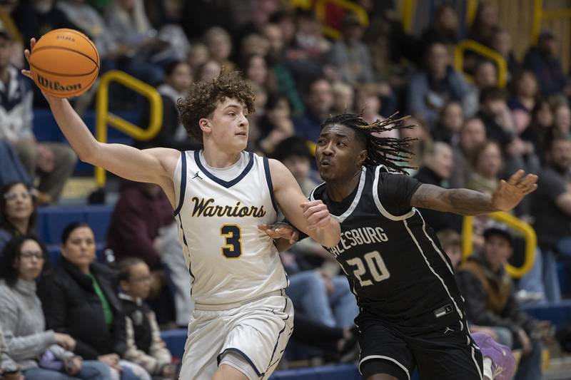 Sterling’s Brady Berlin flags down a pass in front of Galesburg’s Demetrius Watson Tuesday, Feb. 10, 2026.