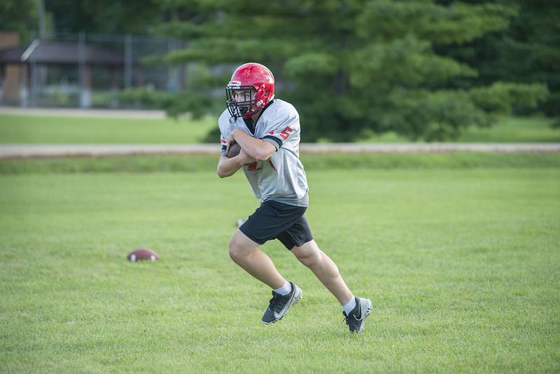 Amboy players run through drills Thursday, July 28, 2022 at the high school. First day of IHSA football practice is just over a week away for local teams.