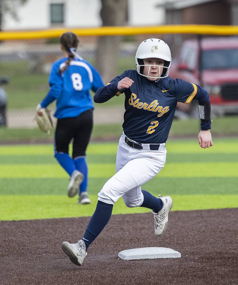 Sterling’s Madison Birdsley rounds second on her way to third against Quincy Tuesday, March 31, 2026.