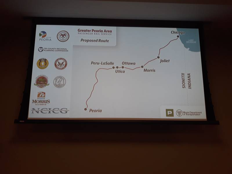 A map of the proposed route of the Peoria-to-Chicago passenger rail was shown on the projection screen Thursday, Feb. 23, 2023, during the North Central Illinois Council of Governments meeting at Illinois Valley Community College.