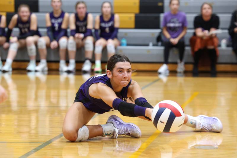 Wilmington's Rachel Smith attempts to save a deflected ball during the Wildcats' loss in three sets, 25-16, 22-25, 17-25, to Pontiac in the IHSA Class 2A Herscher Regional championship on Thursday, Oct. 30, 2025.